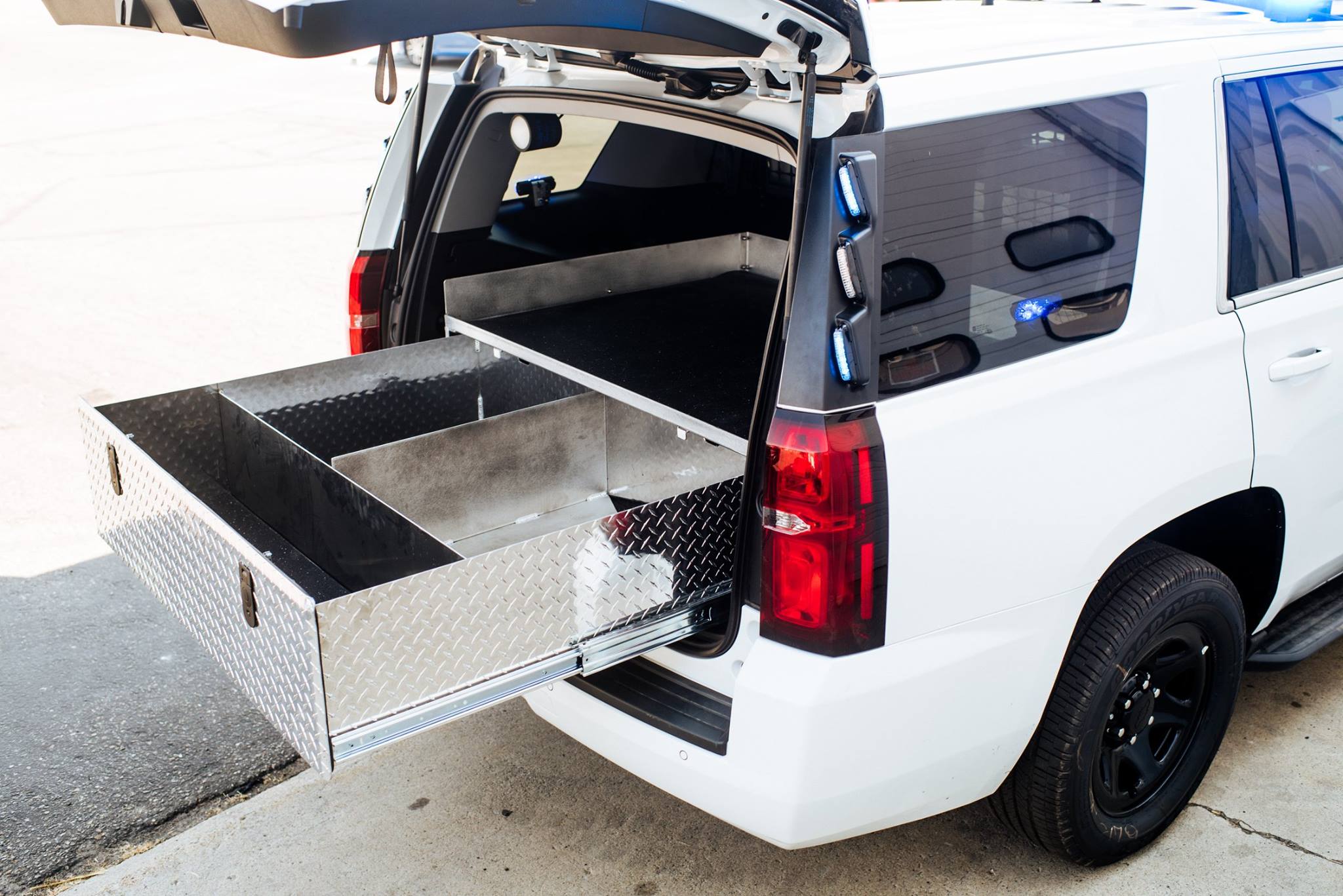 police suv storage system, extendobed, custom truck bed storage, full extension truck bed slides, heavy duty truck bed organizer