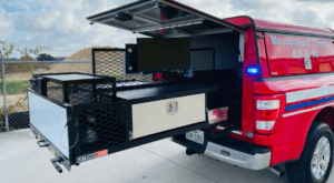 Red truck with an extendobed upfit.