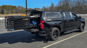 Black truck with an extendobed upfit