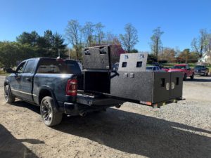 ickup truck with a fully extended Extendobed custom storage slideout, showing the complete unit pulled out from the truck bed.